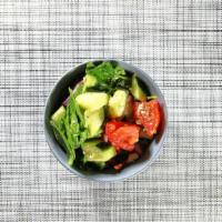 Greek Salad · Iceberg lettuce, cucumbers, green peppers, tomatoes, onions, olives, stuffed grape leaves, a...