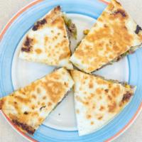 Beef Quesadilla · With cheddar jack cheese, peppers and onions.