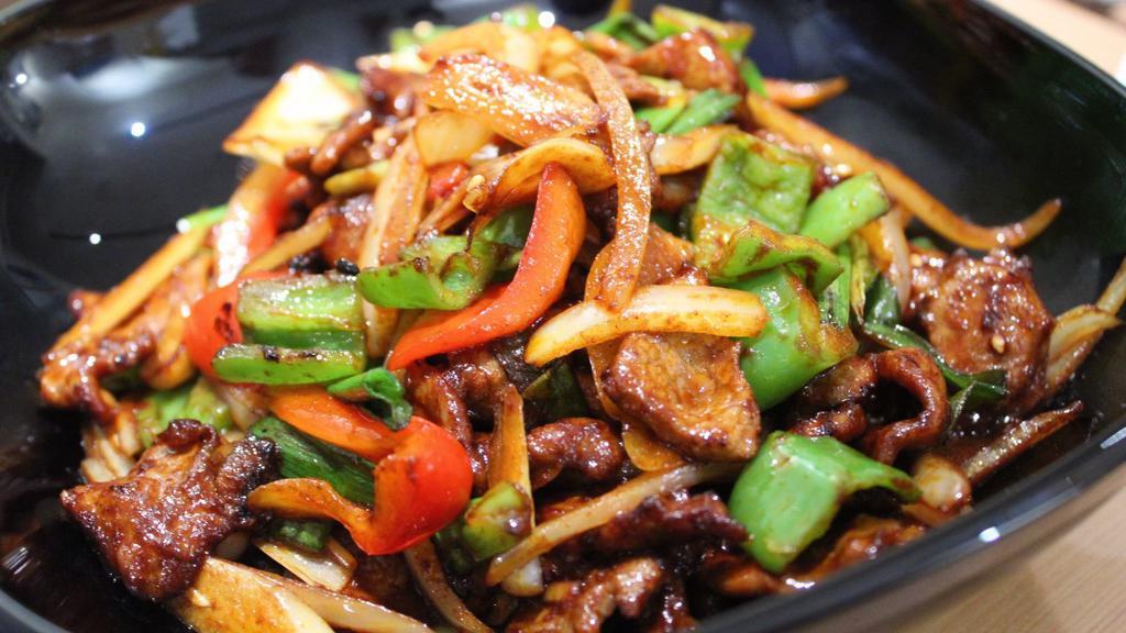 Stir Fried Lamb With Special Flavor/ 香辣羊肉 · Spicy.