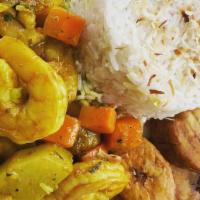 Curry Shrimp + Coconut Rice + Plantains · Curried shrimp served with coconut rice and fried sweet plantains