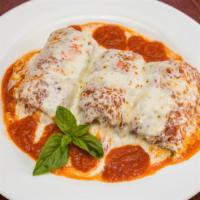 Eggplant Rollatini · Ricotta, Romano, and mozzarella filling rolled up into an egg battered slice of eggplant, to...