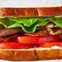 Badass Blt Sandwich  · Served with bacon, lettuce, and tomato with special sauce.