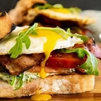 Fried Egg Blt Sandwich · Served with bacon, lettuce, tomato, and two fried eggs on the choice of bread.