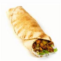 Chicken Shawarma Classic Roll · Roasted strips of marinated chicken, romaine lettuce, cucumber pickles and garlic whip