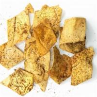 Baked Zaatar Pita Chips · White & whole wheat chips with zaatar, sumac