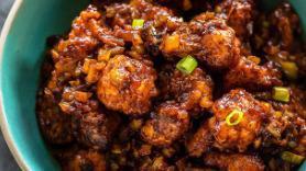 Gobi Manchurian · Indo-Asian fusion of battered, fried cauliflower flavors in a spicy sticky sauce.