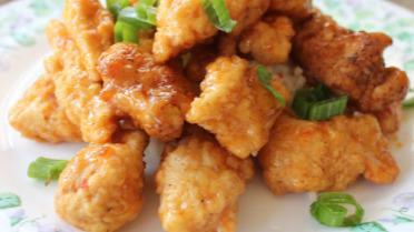Chili Chicken Appetizer · Sweet and spicy chicken strips made in Indo-Chinese style with peppers. Served medium to hot. Can be made mild.