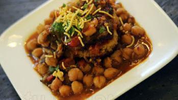 Aloo Tikka With Chana · Deep-fried seasoned potato patties served over curried chickpeas with special mild spices, f...