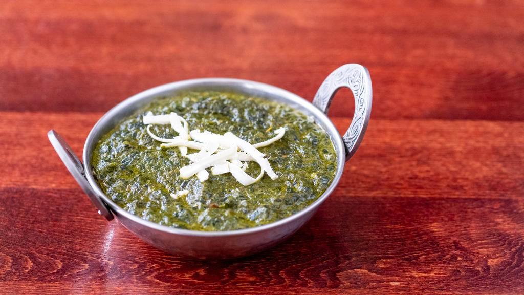 Saag Paneer · Most popular. Cottage cheese and spinach deliciously cooked in garlic and herbs. Served with basmati rice. Vegetarian.