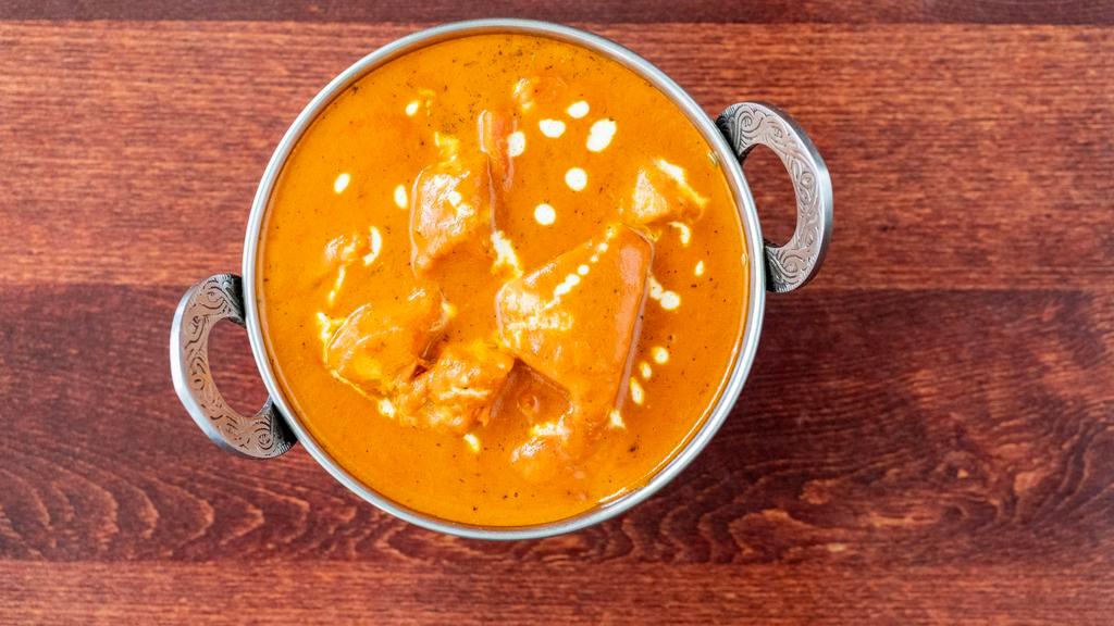 Chicken Tikka Masala · Most popular. Cubes of chicken first broiled in our clay oven then cooked in a mild creamy almond and tomato-based cream sauce.