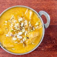 Korma · Most popular. Your choice of meat cooked in rich roasted almond, cashew, raisin and cream sa...