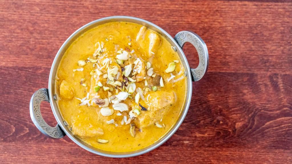 Korma · Most popular. Your choice of meat cooked in rich roasted almond, cashew, raisin and cream sauce.