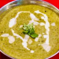 Methi Malai Mutter · Green peas and fenugreek leaves cooked in creamy gravy.