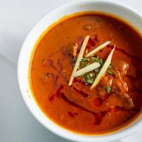 Lamb Rogan Josh · Tender juicy lamb pieces cooked in a traditional Kashmiri style with Indian spices on a low ...