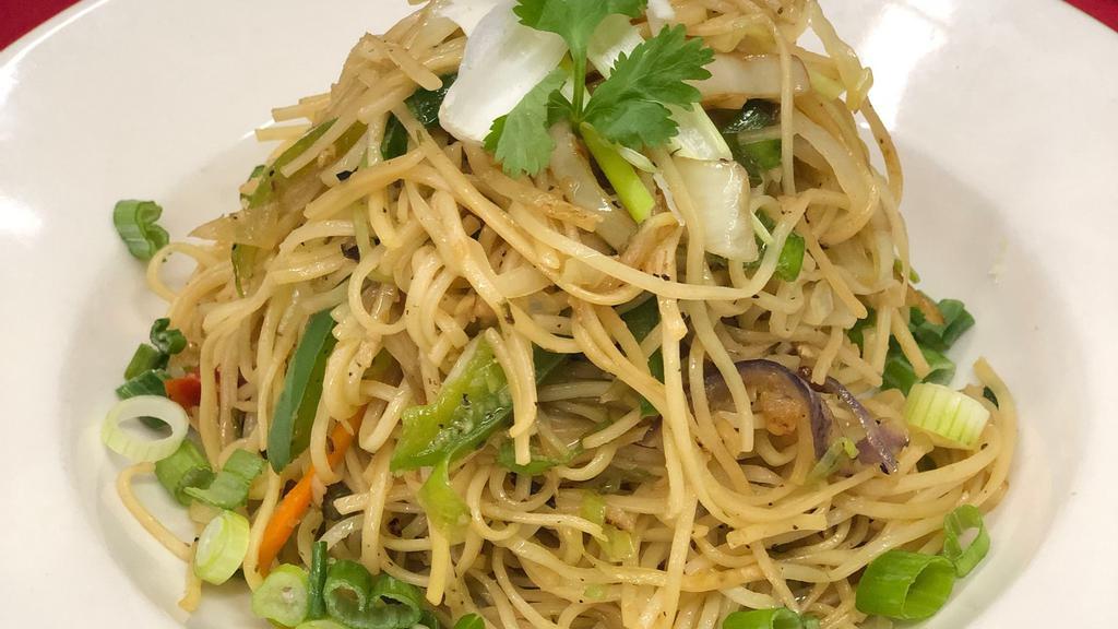 Hakka Noodles · Soft lo-mein noodles topped with your choice of chicken or shrimp, mixed vegetables, and sauce.