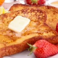 3 Slices Of French Toast With Strawberries · 3 Perfectly cooked French Toast slices, topped with fresh strawberries.