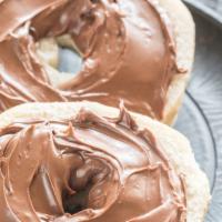 Fresh Bagel With Nutella & Chocolate · Customer's choice of fresh bagel. Served toasted, with Nutella butter and Chocolate.
