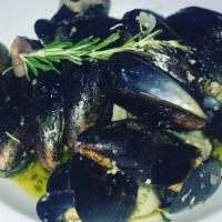 Mussel Beetch · PEI mussels tossed in herbed red sauce or white wine sauce with saffron garlic butter shallots