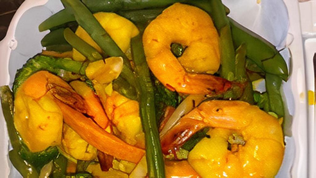 Jumbo Shrimp · shrimp sauteed with saffron garlic shallots, white wine butter, jasmice rice and seasonal vegetables