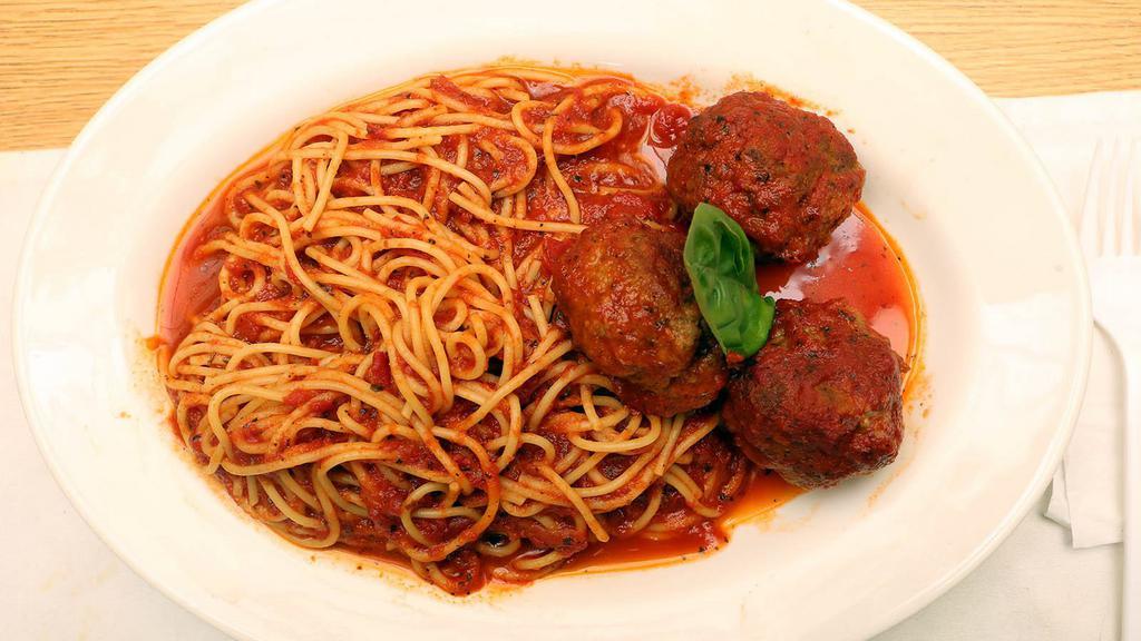 Spaghetti With Meatballs · Spaghetti topped in our homemade meatballs.