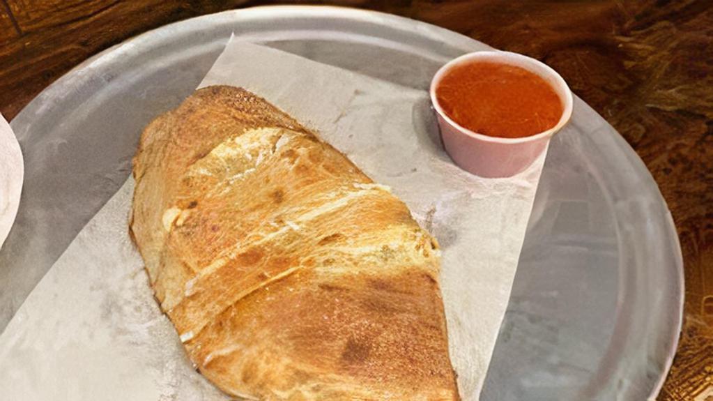 Cheese Calzone · Made with ricotta and mozzarella cheese.