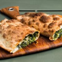Spinach & Cheese Pie · Spinach, onion, mozzarella cheese baked calzone style.