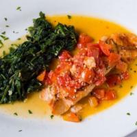 Salmon Sozzi · Grilled Atlantic salmon and warm tomato bruschetta over sauteed spinach. Heart smart.