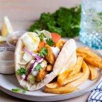 Chicken Gyro · Pita filled with juicy chicken, lettuce, tomatoes, cucumber, onions, pickles, white sauce an...