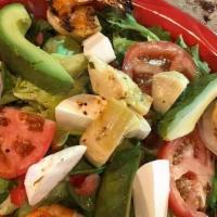  Sliced Avocado Salad Taços · Mixed greens, tomato, fresh mozzarella artichoke and shrimp in the shell.
