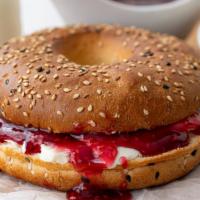 Bagel With Butter & Jelly · Fresh, plain bagel with a generous smear of butter and jelly.