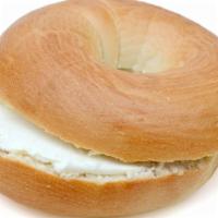 Bagel With Cream Cheese · Fresh, plain bagel with a generous smear of cream cheese.