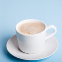 Latte · Deep, dark espresso shots with steamed milk.