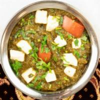 Saag Paneer · Fresh spinach cooked with homemade cheese.