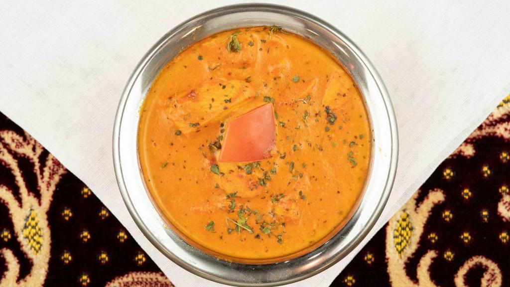 Chicken Makhani · Succulent chicken broiled in tandoor then cooked in delicious blend of creamed tomato sauce.