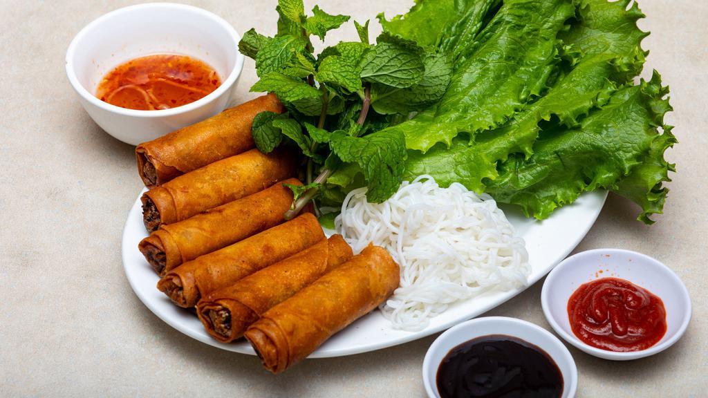 Crispy Spring Rolls · A mixture of chopped shrimps, crab meat, pork hash and vegetables wrapped in rice lumpia and deep-fried. Serve with lettuce mint leaves and house special fish sauce.