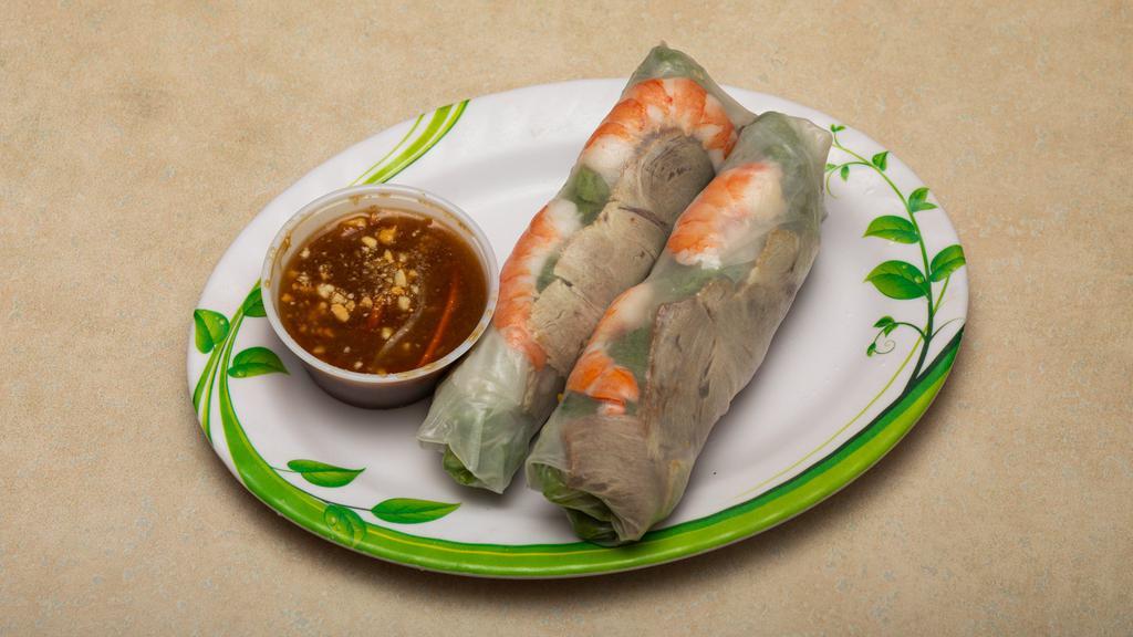 Summer Rolls (2) · Boiled shrimps, slices of pork, vermicelli, mint leaves, lettuce and chive wrapped in paper thin Vietnamese rice sheet, accompanied with peanut sauce.