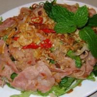 Lemon Beef Salad · Slices of rare beef in special mixture of toasted peanuts, fried onion flakes and Chinese pa...