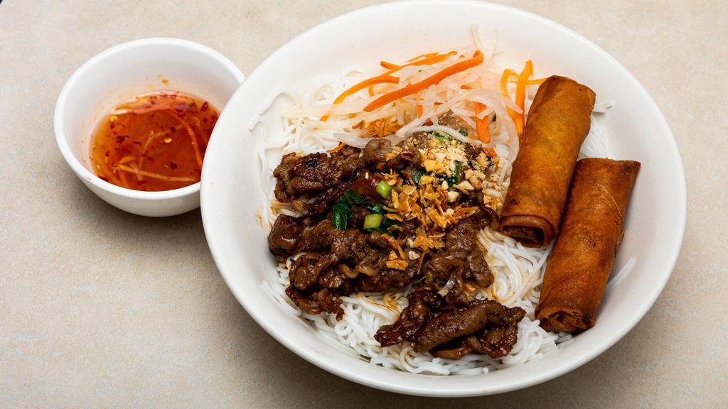 Cold Vermicelli With Spring Rolls & Bbq Pork · Cold vermicelli with spring rolls and BBQ pork.