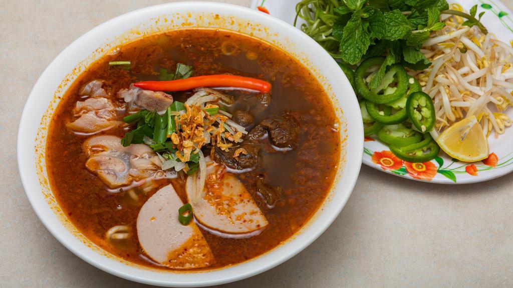 Vermicelli In Hot Spicy Beef Broth · Rice vercimelli in hot steamed beef broth with lemon grass, pork shank, spices and hot chili.