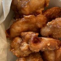 Karaage (Fried Chicken) · Three pieces. Japanese style fried chicken marinated with shio koji. Seasoned with garlic po...