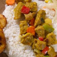 Veggi Chunks Or Tofu · Served with rice and peas or white rice and steamed vegetables and plantains.