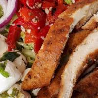 Chicken Club Salad · Diced chicken cutlet, fresh mozzarella, roasted peppers, lettuce, tomatoes and red onions.