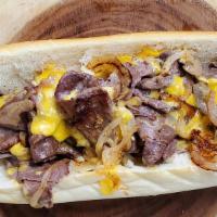 Hot Philly Cheesesteak Sandwich · Loupinos Deli favorite:
