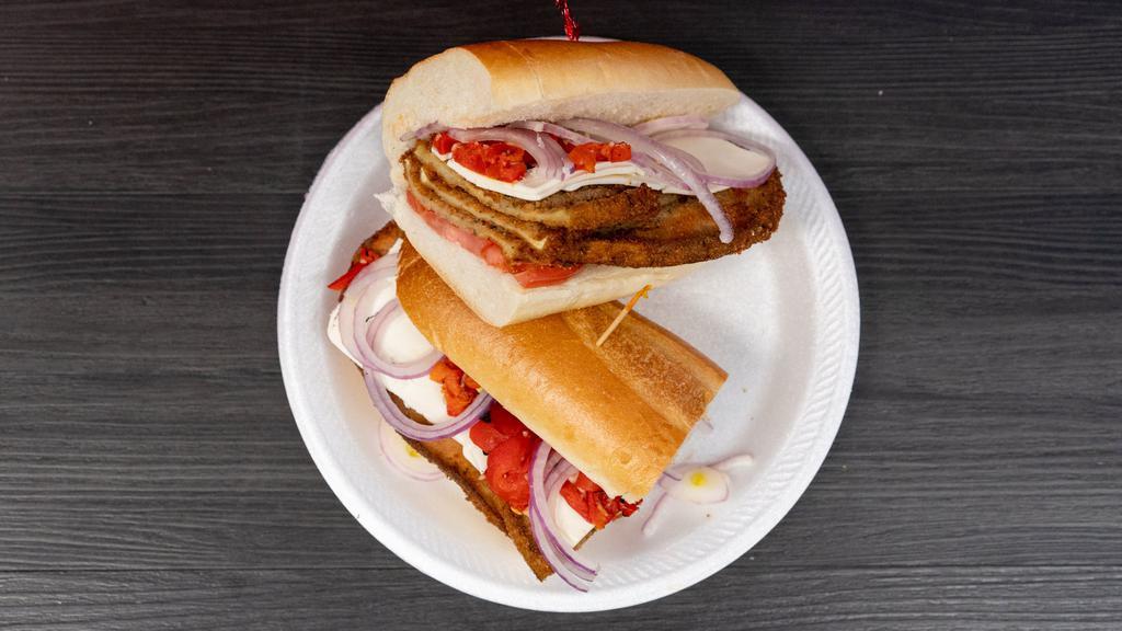Eggplant Club Combo · Breaded eggplant topped with fresh mozzarella, roasted peppers, red onions, tomatoes and olive oil.