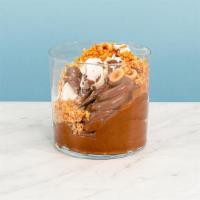 Praline Chocolate Pud · This decadent hazelnut-praline pudding combines rich chocolate pudding with a layer of hazel...