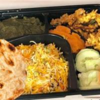 Vegetarian Lunch Box · Comes with :
Vegetarian Appetizer of the day,
Vegetarian Curry of the day,
Choice of  Rice,
...