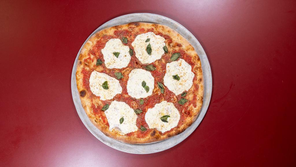 Margherita Pizza · Fresh mozzarella, basil, and olive oil.