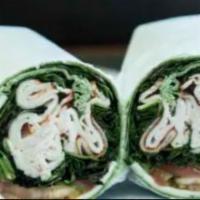 Caesar Wrap · Grilled chicken caesar dressing, croutons and parmesan cheese gourmet wrap.