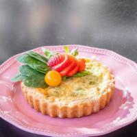 Broccoli Quiche · Savory egg custard baked in a flaky pie crust shell, stuffed with broccoli.