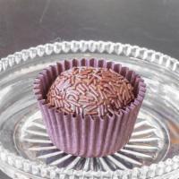 Brigadeiro  · Condensed milk, cocoa powder, butter, and chocolate sprinkles covering the outside layer.